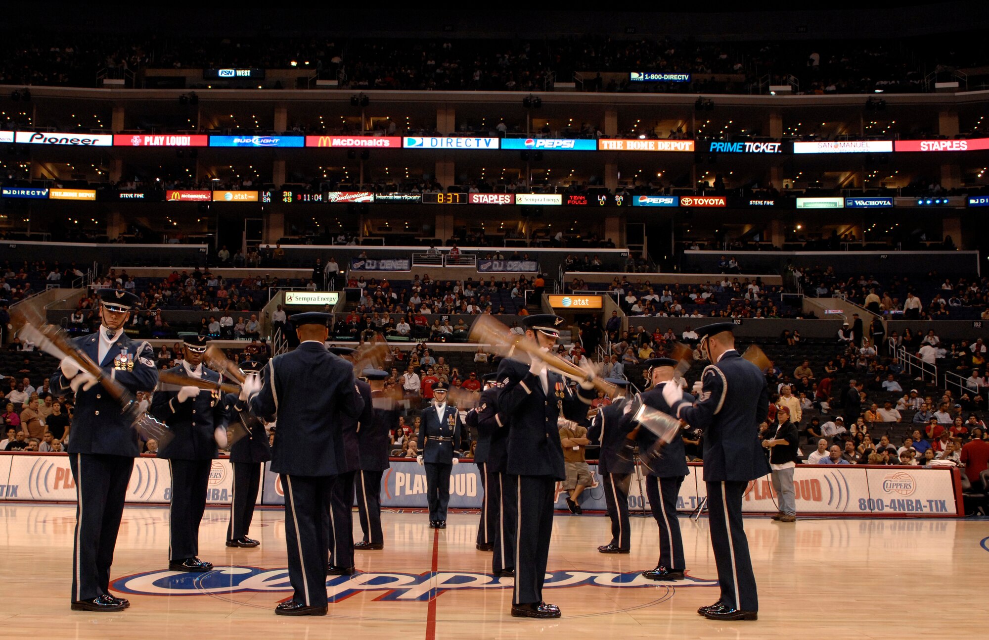 The United States Air Force Honor Guard Drill Team performs Nov. 17 at a Los Angeles Clippers basketball game at the Staples Center in Los Angeles. The Drill Team performed at the game as part of a 23-day temporary duty that started at McChord Air Force Base, Wash. and ended during Los Angeles’s Air Force Week. (U.S. Air Force photo by Senior Airmen Tim Chacon)