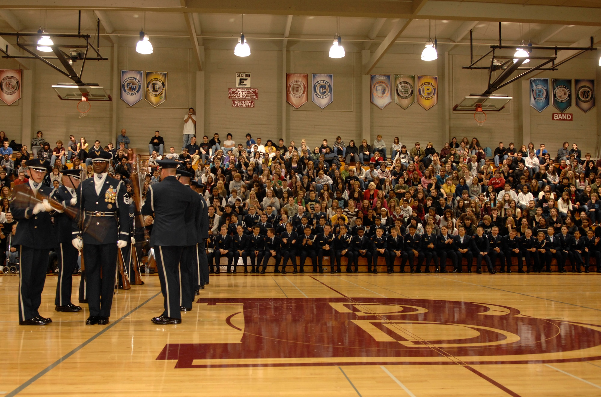 The United States Air Force Honor Guard Drill Team performs Nov. 4 at Bethel High School in Spanaway, Wash. The Drill Team performed at Bethel as part of a 23-day temporary duty that started at McChord Air Force Base , Wash. and ended during Los Angeles’s Air Force Week. (U.S. Air Force photo by Senior Airmen Tim Chacon)