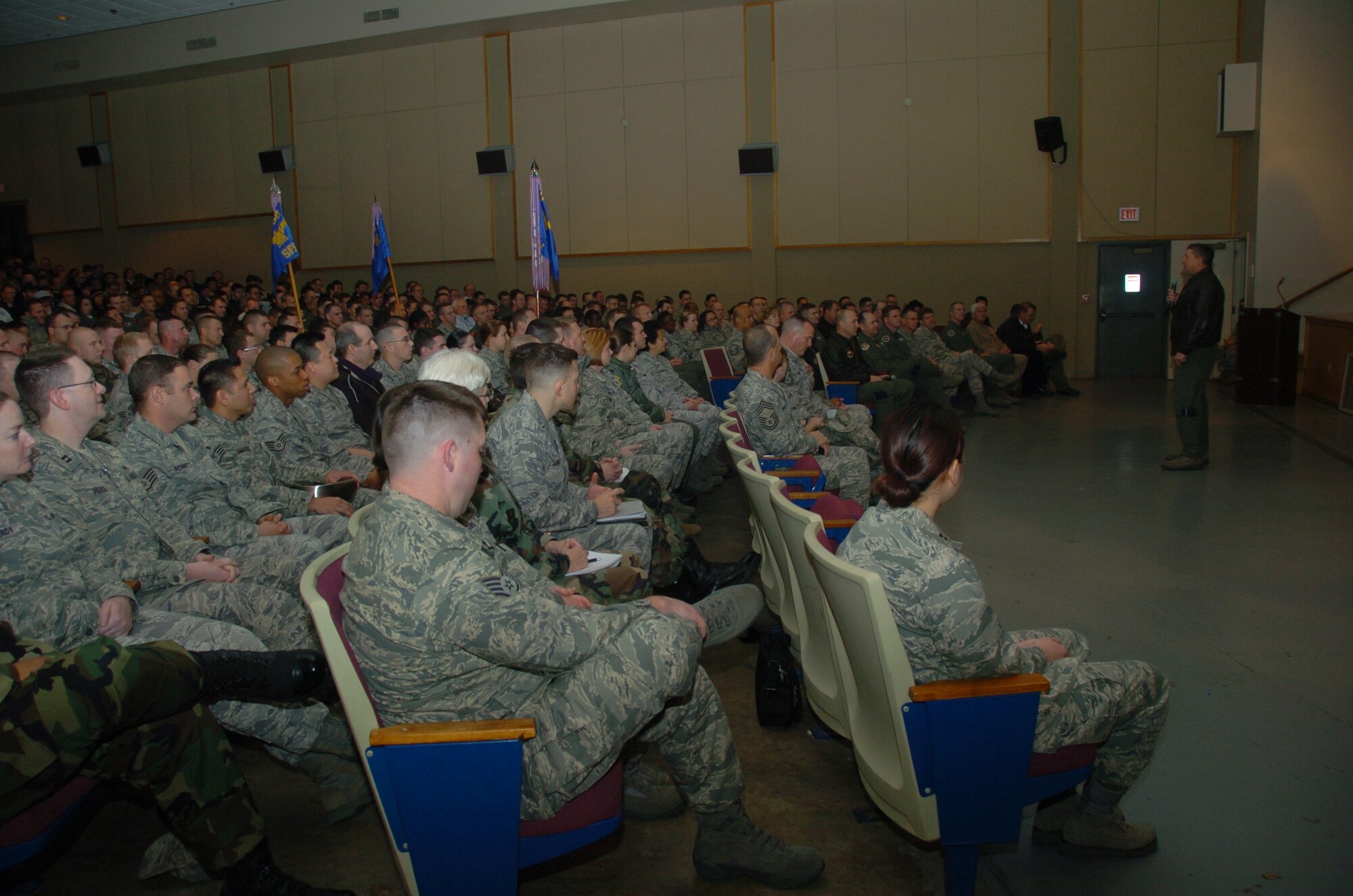 ALTUS AIR FORCE BASE, Okla. -- Members of the 97th Air Mobility Wing listen to Maj. Gen. Gregory Feest, 19th Air Force commander, as he responds to questions from wing members at a Commander’s Call Dec. 10. (U.S. Air Force photo/Airman 1st Class Tiffany M. Deuel)
