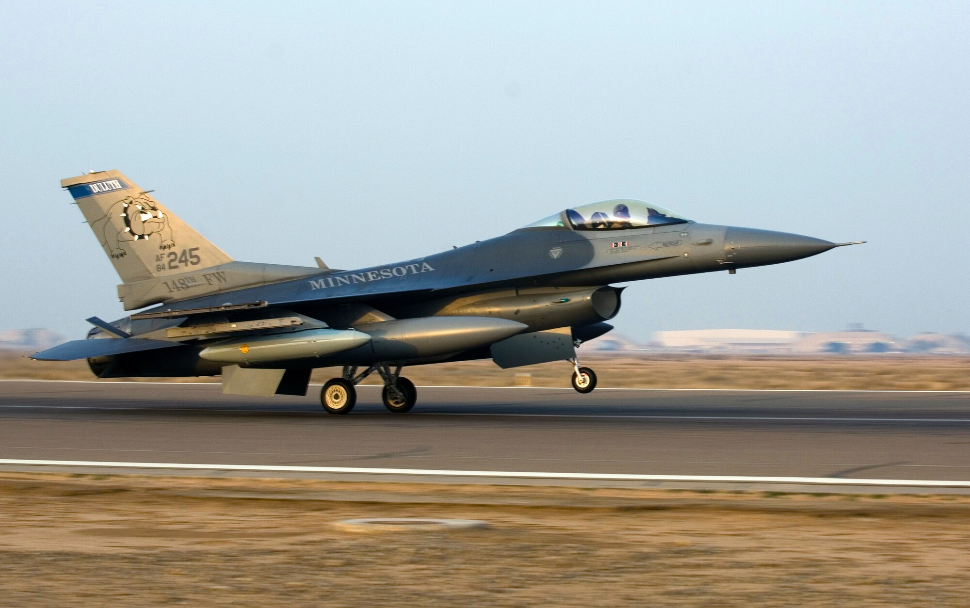 An F-16 Fighting Falcon piloted by Maj. Curt Grayson touches down at Joint Base Balad, Iraq, Dec. 10. Grayson's home unit, the Minnesota Air National Guard's 179th Fighter Squadron, will carry the 332nd Expeditionary Fighter Squadron designation while deployed. Grayson is a native of Esco, Minn. (U.S. Air Force photo/Tech. Sgt. Erik Gudmundson)