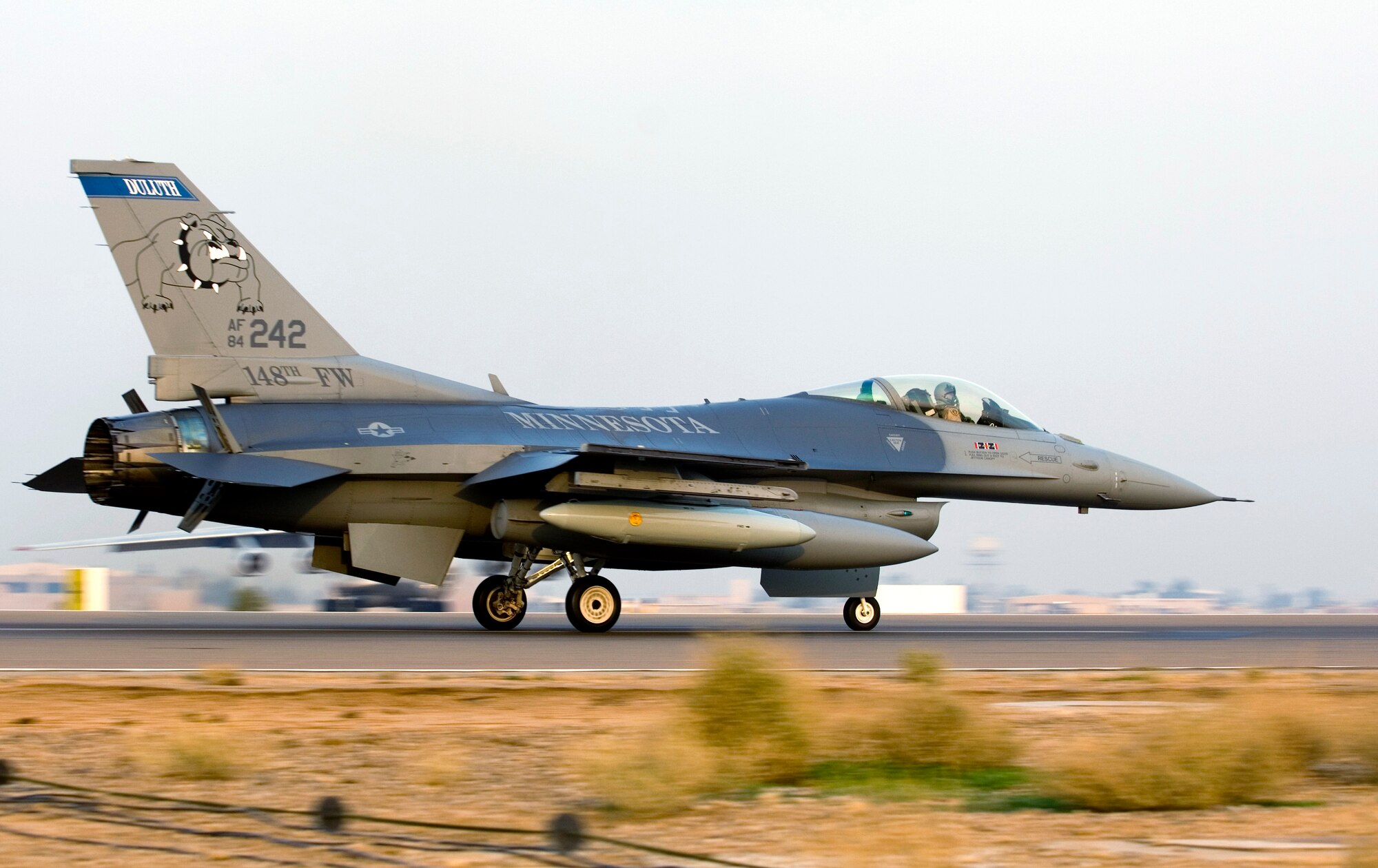 An F-16 Fighting Falcon piloted by Maj. Troy Zierden coasts to a halt after landing at Joint Base Balad, Iraq, Dec. 10. Zierden's home unit, the Minnesota Air National Guard's 179th Fighter Squadron, will carry the 332nd Expeditionary Fighter Squadron designation while deployed. Zierden is a native of Duluth, Minn. (U.S. Air Force photo/Tech. Sgt. Erik Gudmundson)