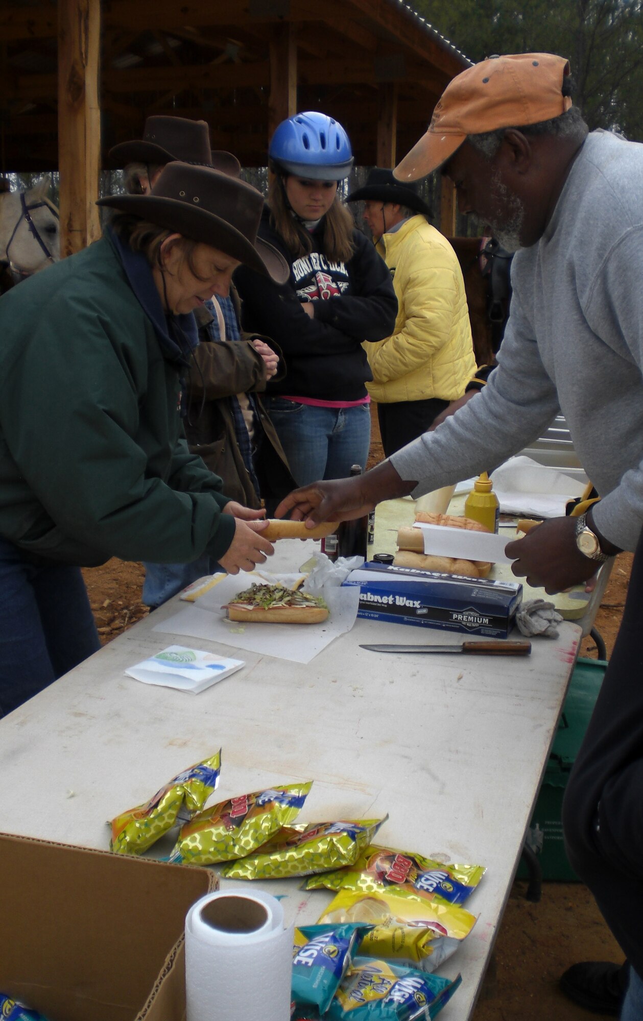 SHAW AIR FORCE BASE, S.C. -- Volunteers help serve lunch to riders participating in Hoofin? for Heroes on Saturday, Dec. 7 at Double J Ranch in Whitmire, S.C.  Proceeds from Hoofin? for Heroes goes directly toward the Wound Warrior Project, a nonprofit organization that seeks to assist men and women of the U.S. armed forces who have been severely injured in conflicts overseas. (U.S. Air Force photo/2nd Lt. Noelle Caldwell)  