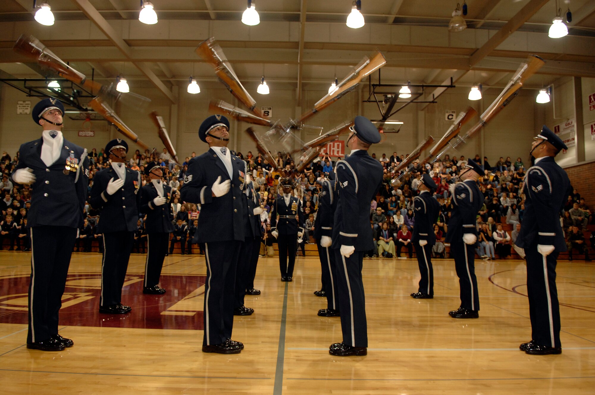 The United States Air Force Honor Guard Drill Team performs Nov. 4 at Bethel High School in Spanaway, Wash. The Drill Team performed at Bethel as part of a 23-day temporary duty that started at McChord Air Force Base , Wash. and ended during Los Angeles’s Air Force Week.  (U.S. Air Force photo by Senior Airman Tim Chacon)