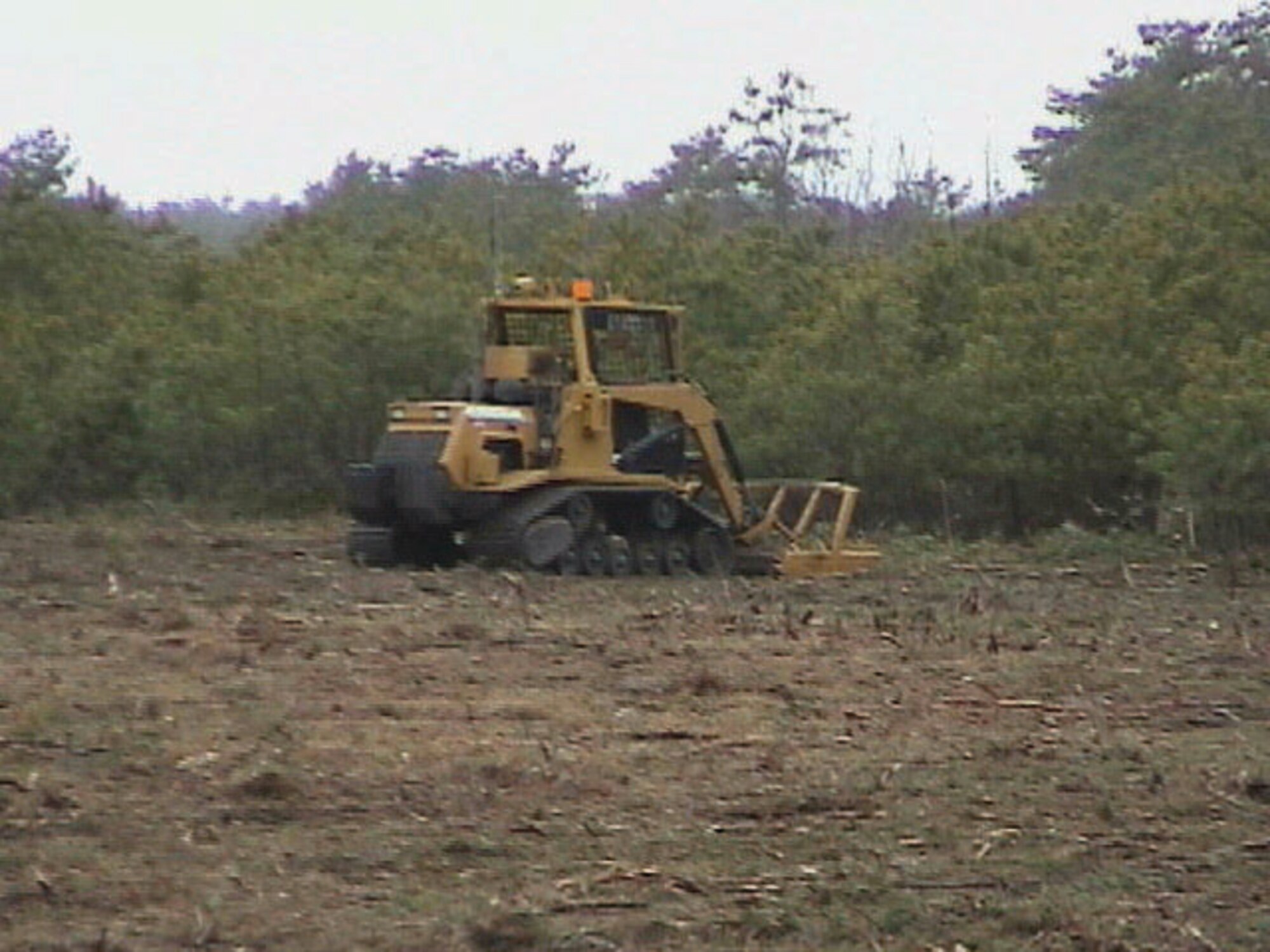 All-Purpose Remote Transport System (ARTS), shown with brush cutter attachment prior to beginning vegetation clearance at the Massachusetts Military Reserve. (U.S. Air Force photo)