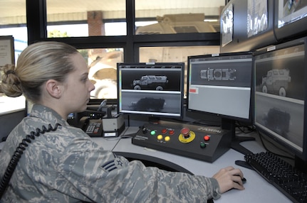 Gen. Arthur Lichte, Air Mobility Command commander, said it is important to acknowledge the mission would not be accomplished without a dedicated and very capable support system. Senior Airman Brandy Turner inspects a mine-resistant, ambush-protected vehicle using the Z-Portal X-ray system on base Jan. 8. Airman Turner is an augmentee for the 437th Security Forces Squadron. (U.S. Air Force photo/James Bowman)