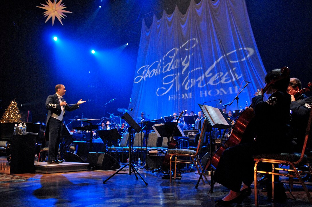 Maj. Don Schofield leads the Band of the Air Force Reserve and Air Force Strings during the 2008 Holiday Notes from Home concert at the Grand Ole Opry House in Nashville, Tenn. The concert is annual holiday event as a tribute to the military.  Major Schofield is the commander of Band of the Air Force Reserve. (U.S. Air Force photo/Ken Hackman)