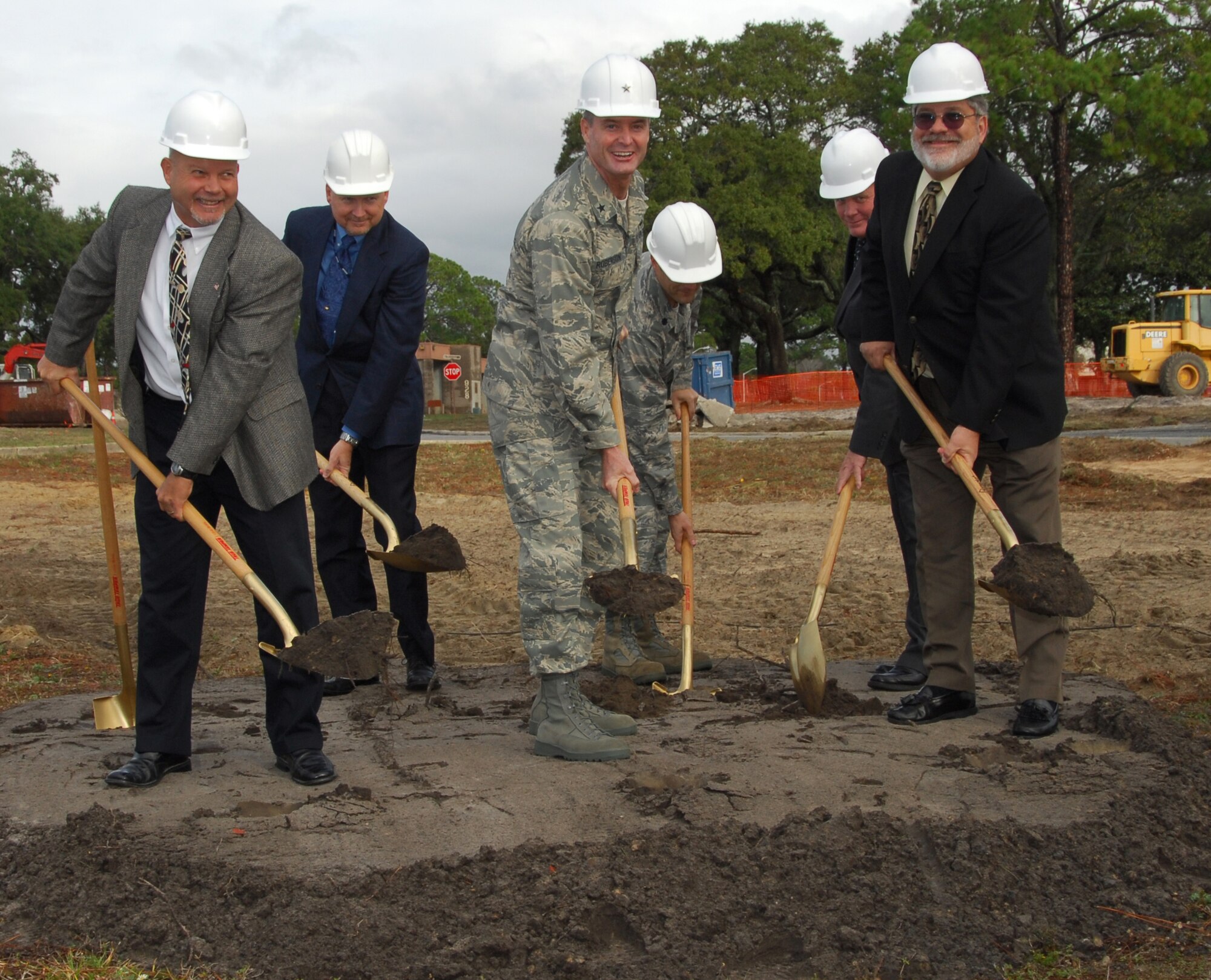 Brig. Gen Darryl Roberson, 325th Fighter Wing commander, joins other contributing members to the project in breaking ground for the new ‘Fit to Fight’ Tyndall Fitness  Center during the groundbreaking ceremony here today.  (U.S. Air Force photo by Lisa Norman)  