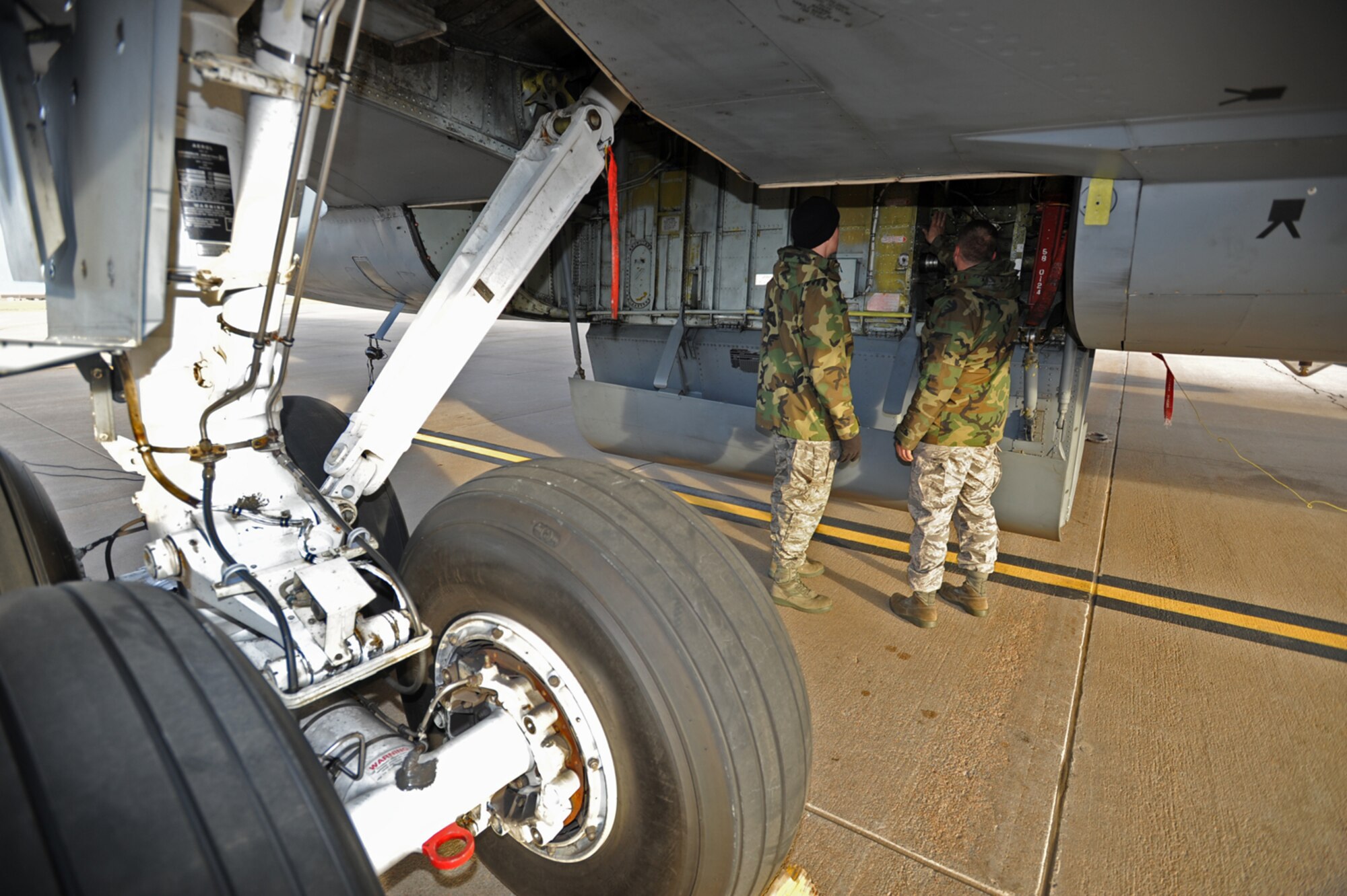 Tech. Sgt. Greg Mitchell (on right) helps another crew chief inspect a KC-135 Statotanker during the 931st Air Refueling Group's unit training assembly in December. Sergeant Mitchell is a crew chief assigned to the 931st Aircraft Maintenance Squadron. The 931st ARG is an Air Force Reserve unit at McConnell Air Force Base, Kan. (U.S. Air Force photo/Tech. Sgt. Jason Schaap)