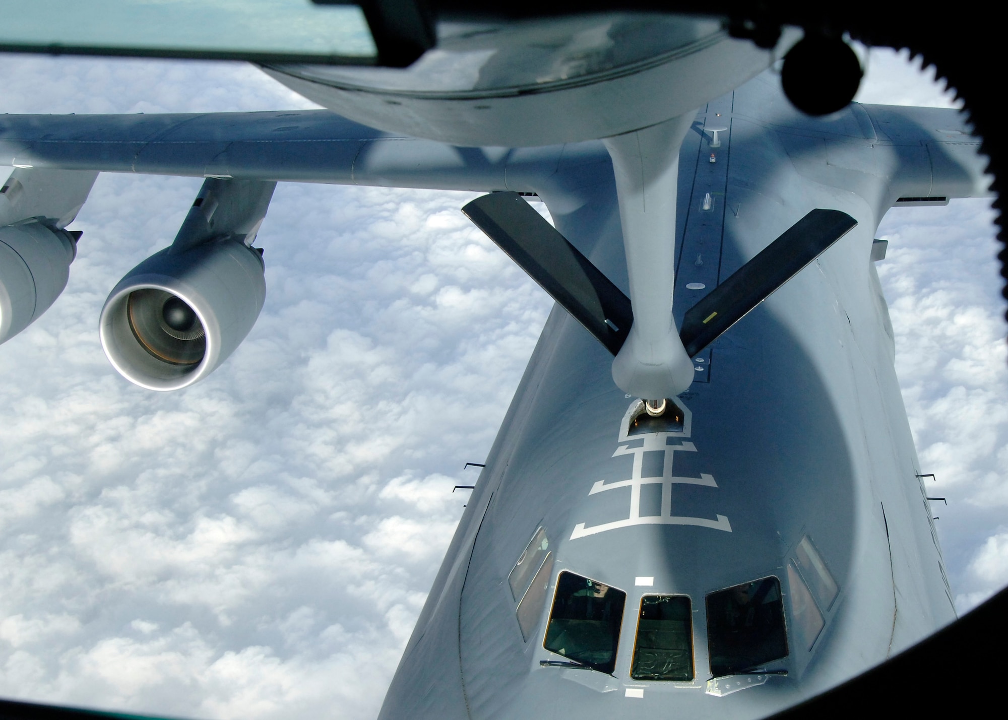 MCCONNELL AIR FORCE BASE, Kan. -- A C-5M Super Galaxy test aircraft from a Lockheed Martin facility in Marietta, Ga., receives its first operational refueling from a McConnell KC-135R Stratotanker, Dec. 3. (Photo by Senior Airman Anthony Mejia)