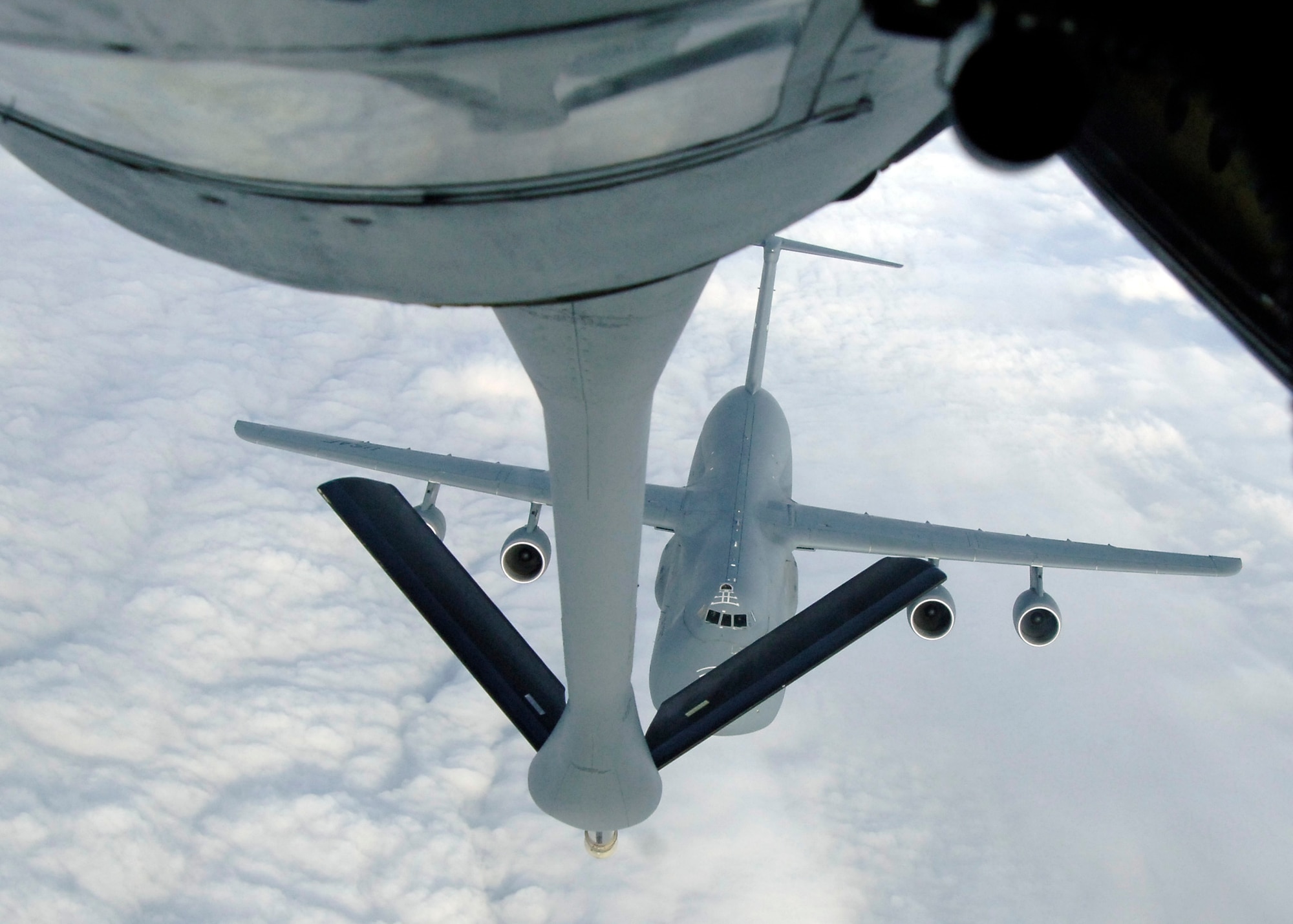 MCCONNELL AIR FORCE BASE, Kan. -- A C-5M Super Galaxy test aircraft from a Lockheed Martin facility in Marietta, Ga., approaches the boom of a McConnell’s KC-135R Stratotanker to receive fuel, Dec. 3. (Photo by Senior Airman Anthony Mejia)