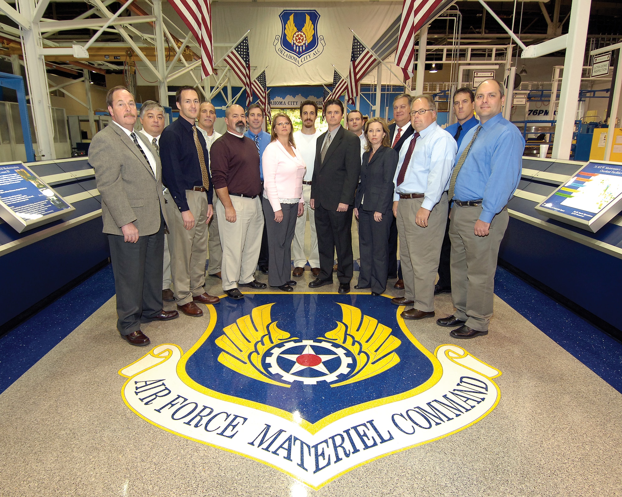 SOSU graduates are, front from left; Thomas Helsley, Kevin Cook, Karl McCausey, Kay Kenyon, Steve Stoner, Caroline Moore, Joe Starwalt and Jason Puder. Back from left are; Carl Garcia, David Painter, Lee Jones, Steven Hellums, Kevin Jaworsky, Bill Hudson and Brian Gilliam.(Air Force photo/Margo Wright) 
