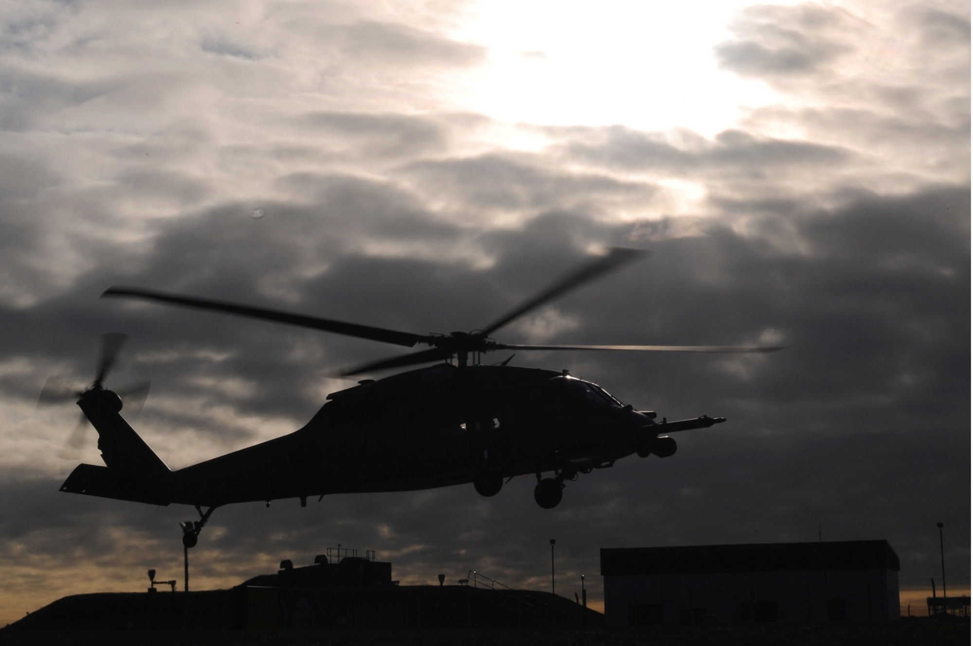 An HH-60G Pave Hawk with the 56th Rescue Squadron takes off to fly more than 500 miles west of Ireland for a real-world rescue mission Dec. 10 at Royal Air Force Lakenheath, England. A crew member of a cargo ship suffered a serious head injury requiring a medical evacuation, and U.S. forces were called upon to help. (U.S. Air Force photo/Staff Sgt. Nathan Gallahan) 
