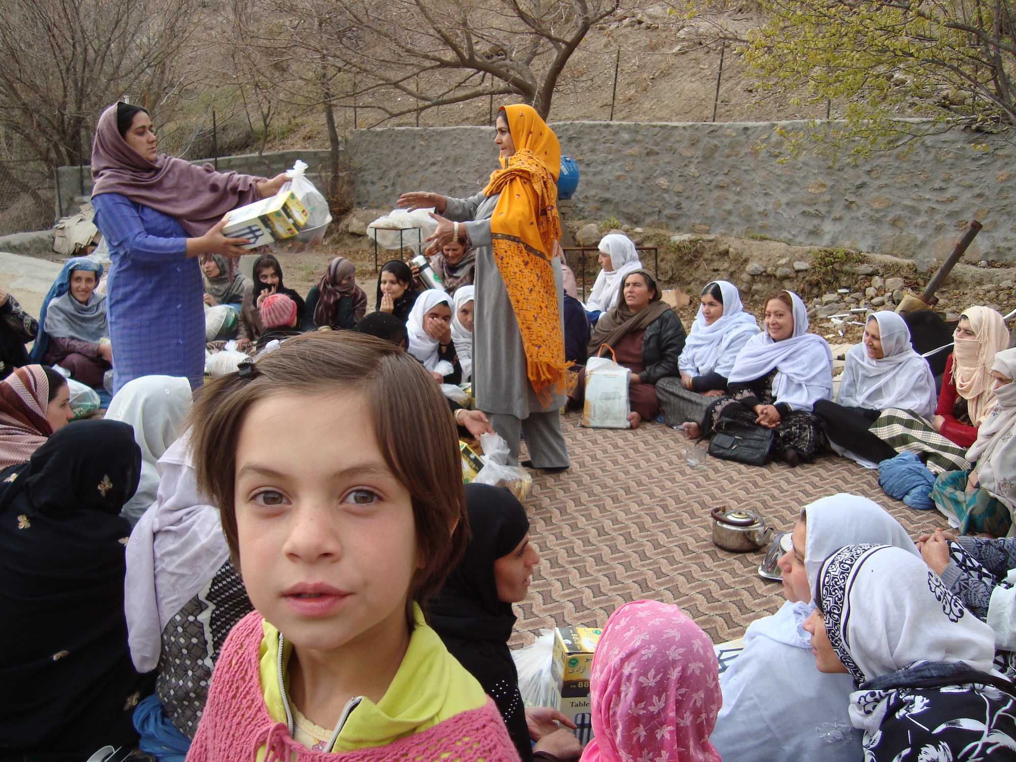 Afghan women attend last week’s shura in Bazarak District.  Thirty-four women from 15 different villages in Bazarak District gathered together with Miriam Panjshiri, the director of woman’s affairs, and the Panjshir Provincial Reconstruction Team woman’s affairs team, Dec. 2.  The women discussed needs and planned for future projects.
