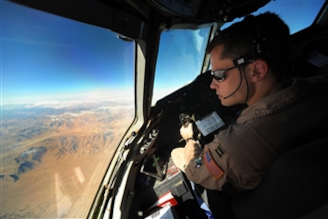 U.S. Air Force Capt. Bachelor, a KC-10 Extender aircraft pilot from the 908th Expeditionary Aerial Refueling Squadron, flies the refueling track during a flight over Afghanistan on Dec. 10, 2008.  