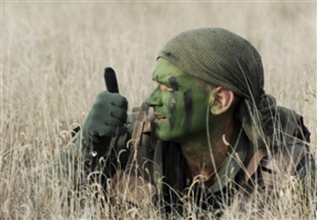 U.S. Air Force Tech. Sgt. Anthony Proctor undergoes code of conduct continuation training as part of the survival, evasion, resistance and escape program at Cannon Air Force Base, N.M., on Dec. 5, 2008.  The program supports the Guardian Angel weapon system, an Air Force personnel recovery mission comprised of survival, evasion, resistance and escape specialists, combat rescue officers and pararescue jumpers.  Proctor is assigned to the 27th Special Operations Support Squadron.  