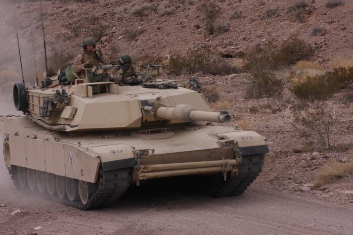 A tank with Company A, 1st Tank Battalion, rolls down a pass to make its way to its next fire mission during the battalion’s combined arms exercise known as Steel Knight, which ran from Dec. 6 through 12