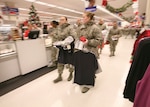 12/6/2008 - Basic trainees rush through the base exchange to shop for holiday gifts during the Shop-A-Trainee program Dec. 6. (USAF photo by Robbin Cresswell)