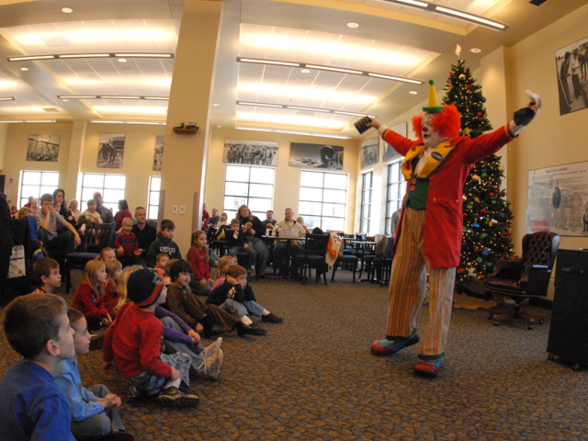 Crusty the Clown entertains the Happy Hooligan family members at the North Dakota Air National Guard during the 119th Wing Children’s Christmas Party on December 8, 2007.  