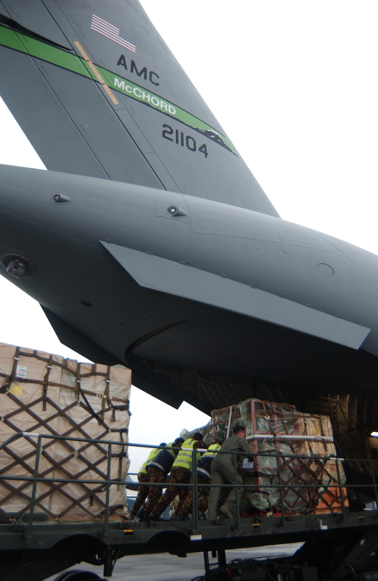 Team McChord Airmen and members of the New Zealand Defence Force load cargo prior to an Operation Deep Freeze mission from Christchurch, New Zealand, to Antarctica Dec. 2. (U.S. Air Force photo/Staff Sgt. Eric Burks)