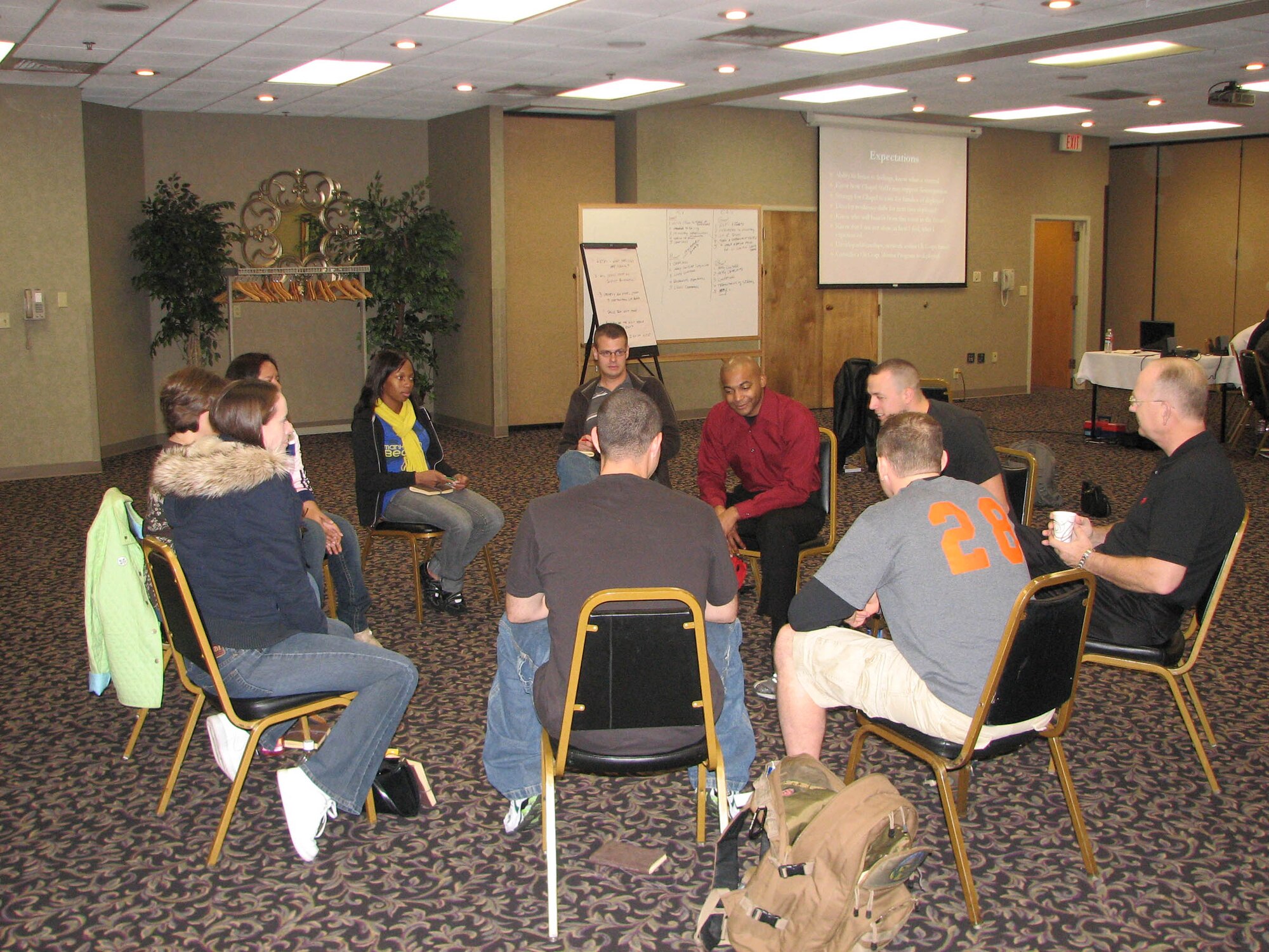 Chaplains and chaplain assistants share their deployment experiences during a small-group discussion at the November Chaplain Corps Post-Deployment Reintegration Retreat at Lady of the Snows in Bellville, Ill. (Courtesy Photo)