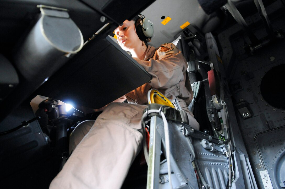 Capt. Daniela Lozano powers up the B-1B Lancer and proceeds through the weapons system preflight checklist Dec. 9 at an air base in Southwest Asia. A preflight crew prepares the aircraft for flight in order to allow the crew actually flying to maximize their available flight time. Captain Lozano is a native of Dallas and is deployed from Ellsworth Air Force Base, S.D. She is a weapons systems officer assigned to the 34th Expeditionary Bomb Squadron. (U.S. Air Force photo/Tech. Sgt. Michael Boquette) 

