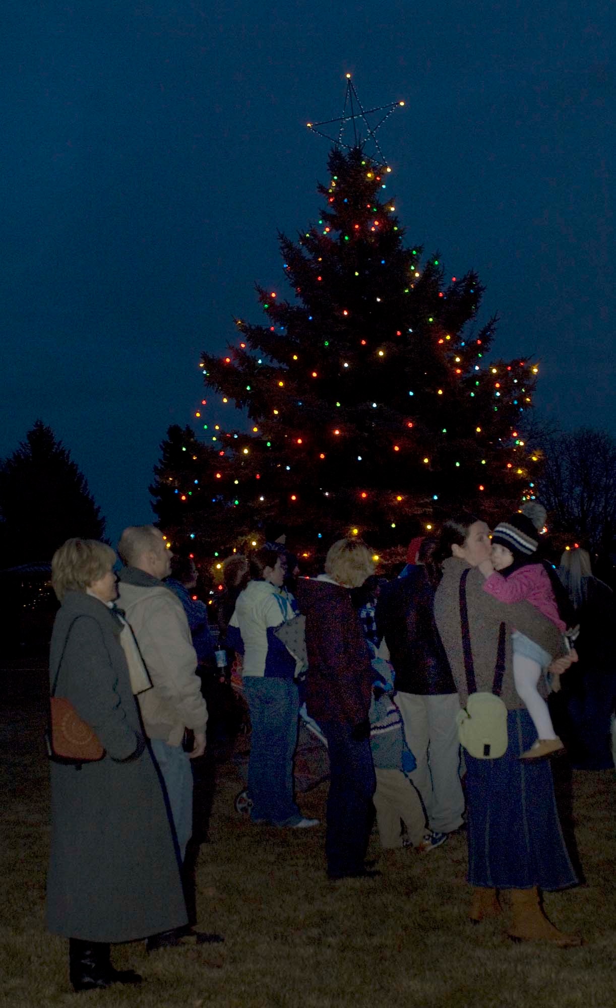 FAIRCHILD AIR FORCE BASE, Wash. – Fairchild families observe the annual Christmas-tree lighting ceremony near the main gate Dec. 3. The ceremony has been held since the base first opened. (U.S. Air Force photo / Airman 1st Class Darlene West)

