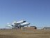 The Space Shuttle Endeavour and its Shuttle Carrier Aircraft/Orbital Vehicle (SCA/OV) takes off from Carswell Field on Naval Air Station, Joint Reserve Base, Fort Worth, Texas, after spending the night on Base. Carswell Field is the alternate landing location for the Space Shuttle due to its 1,200 ft runway. December 11, 2008 (USAF photo by Staff Sergeant Ivyann Castillo) 