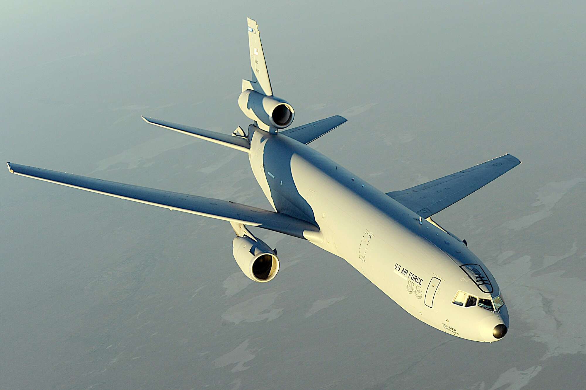 A KC-10 Extender from the 908th Expeditionary Aerial Refueling Squadron flies over Afghanistan on Dec. 11. Using either an advanced aerial refueling boom, or a hose and drogue centerline refueling system, the KC-10 can refuel a wide variety of U.S. and allied military aircraft within the same mission. (U.S. Air Force photo/Staff Sgt. Aaron Allmon)