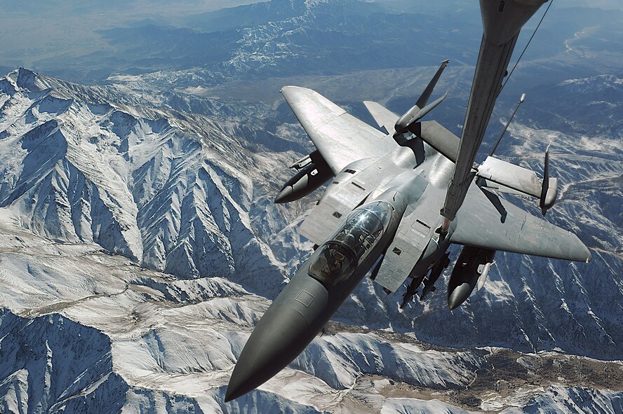 A KC-10 Extender from the 908th Expeditionary Aerial Refueling Squadron refuels a F-15E Strike Eagle from the 391st Expeditionary Fighter Squadron Dec. 11, 2008, over Afghanistan. The KC-10 holds six tanks that carry more than 356,000 pounds of fuel. (U.S. Air Force photo/Staff Sgt. Aaron Allmon) 