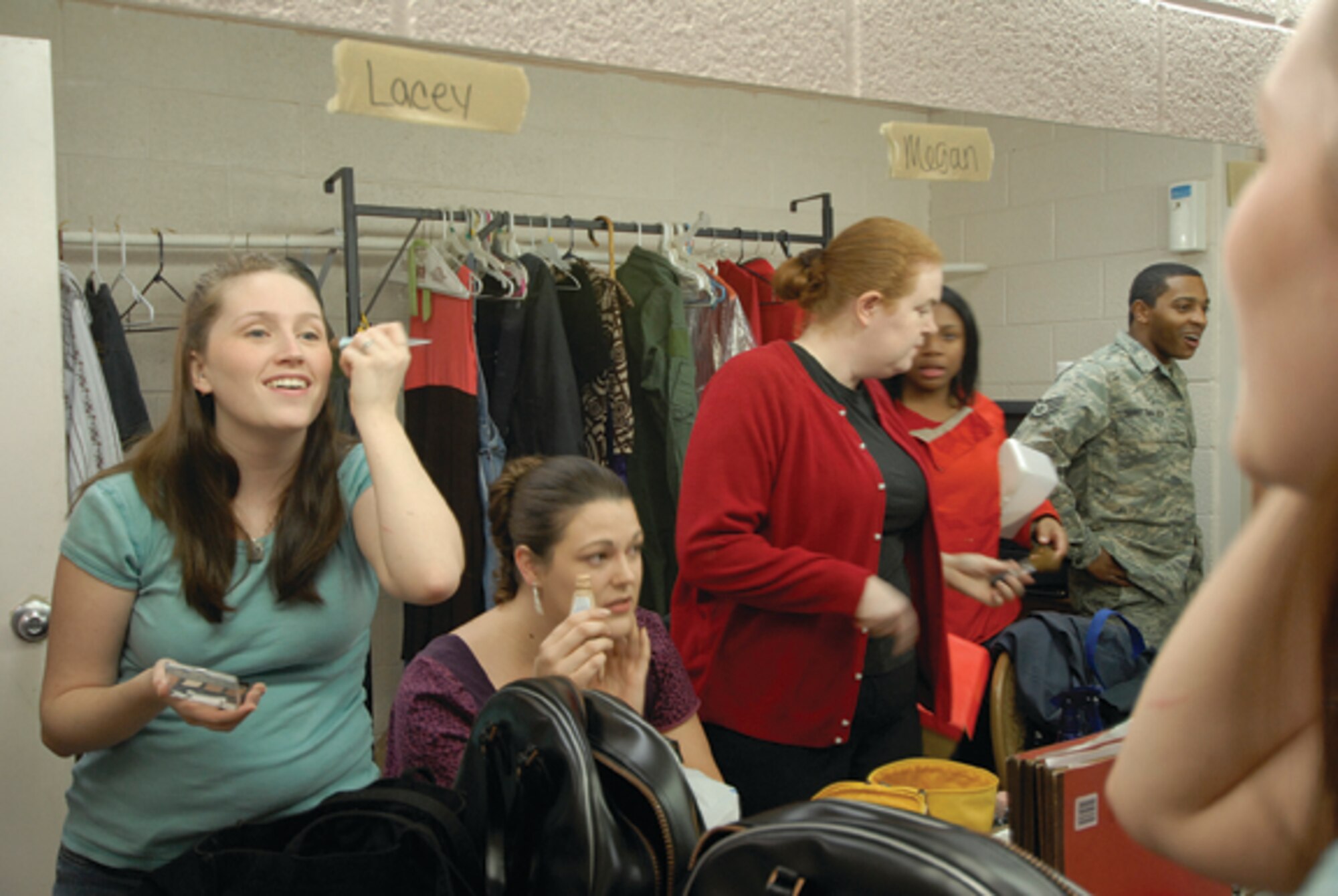Members of the Luke Experience, a base performance group, put on a Christmas show, Luke Christmas Carol this week at the base theater.