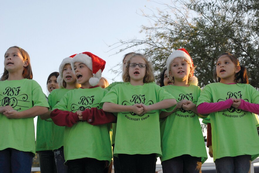 Second and third graders from Rancho Santa Fe Elementary School's Discovery Choir sang a variety of holiday songs at Holiday Magic Dec. 5 in the Desert Star Club parking lot.