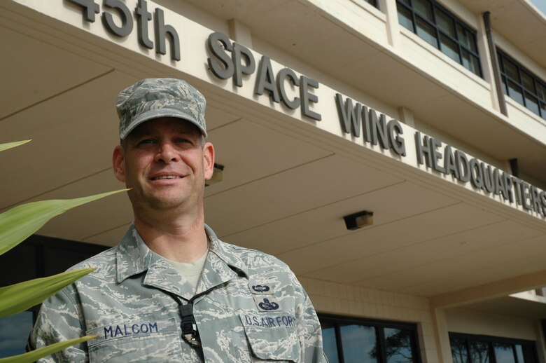 The new Command Chief Master Sergeant of the 45th Space Wing, Larry Malcom, outside the wing headquarters building Dec. 8. (U.S. Air Force photo by Chris Calkins)