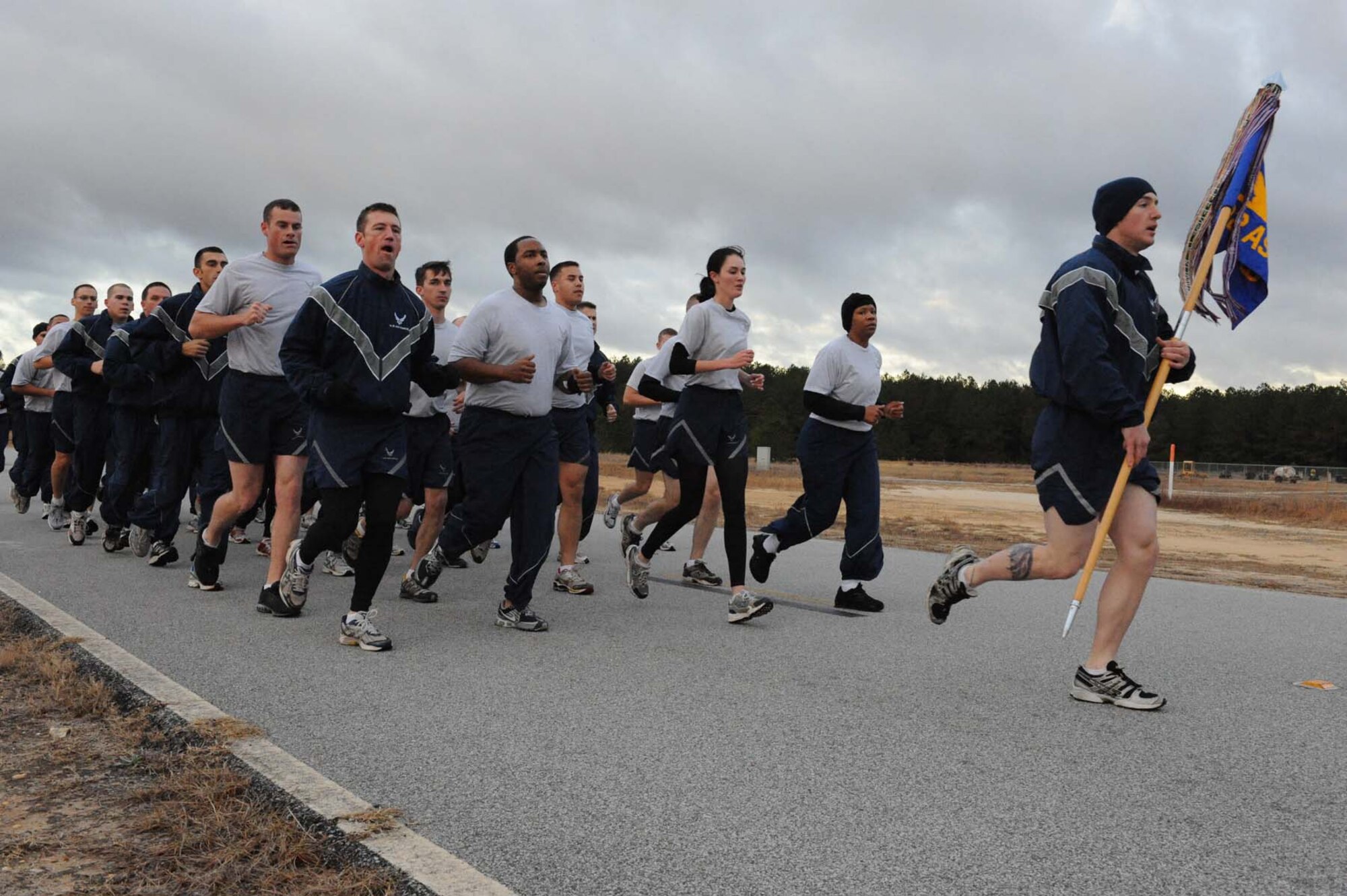 SHAW AIR FORCE BASE, S.C. -- Airmen from the 682nd Air Support Operations Squadron run in formation for 3.1 miles during the Shaw AFB monthly fun run on Dec. 12, 2008. Shaw AFB holds a fun run at least twice a month to keep airmen fit to fight.(U.S. Air Force photo/Senior Airman Matthew Davis)