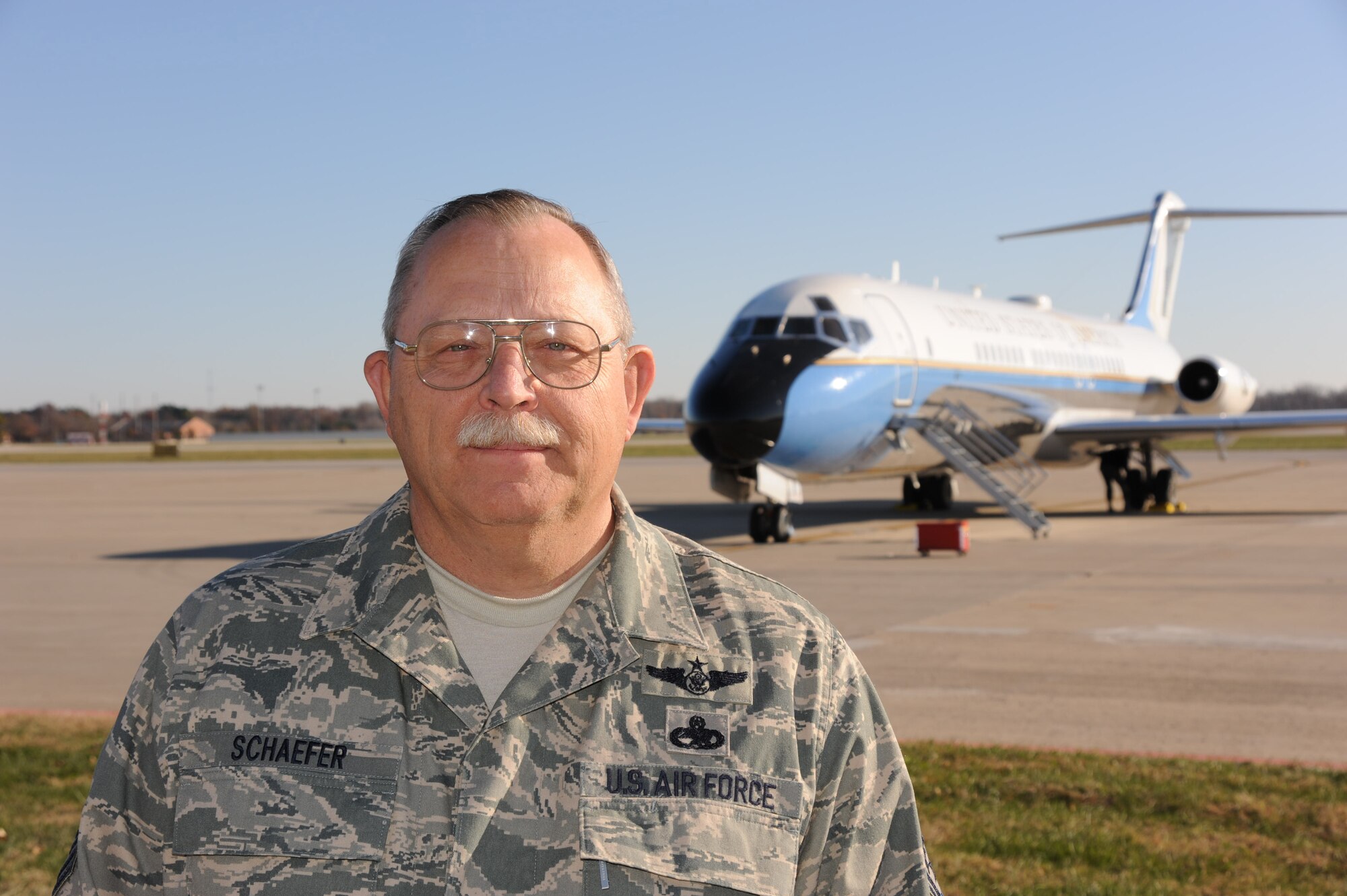 Master Sgt. Don Schaefer stands in front of the 932nd Airlift Wing's C-9C airplane as he prepares to retire from the Air Force Reserve Command.  His previous job was with the 939th Airlift Wing in Oregon.  "I have spent from September 1976 till present in the Air Force Reserve. I did not really start out thinking, 'I am a military type guy,' but looking back at it now I guess you could say I am," he concluded.  (U.S. Air Force photo/Maj. Stan Paregien)