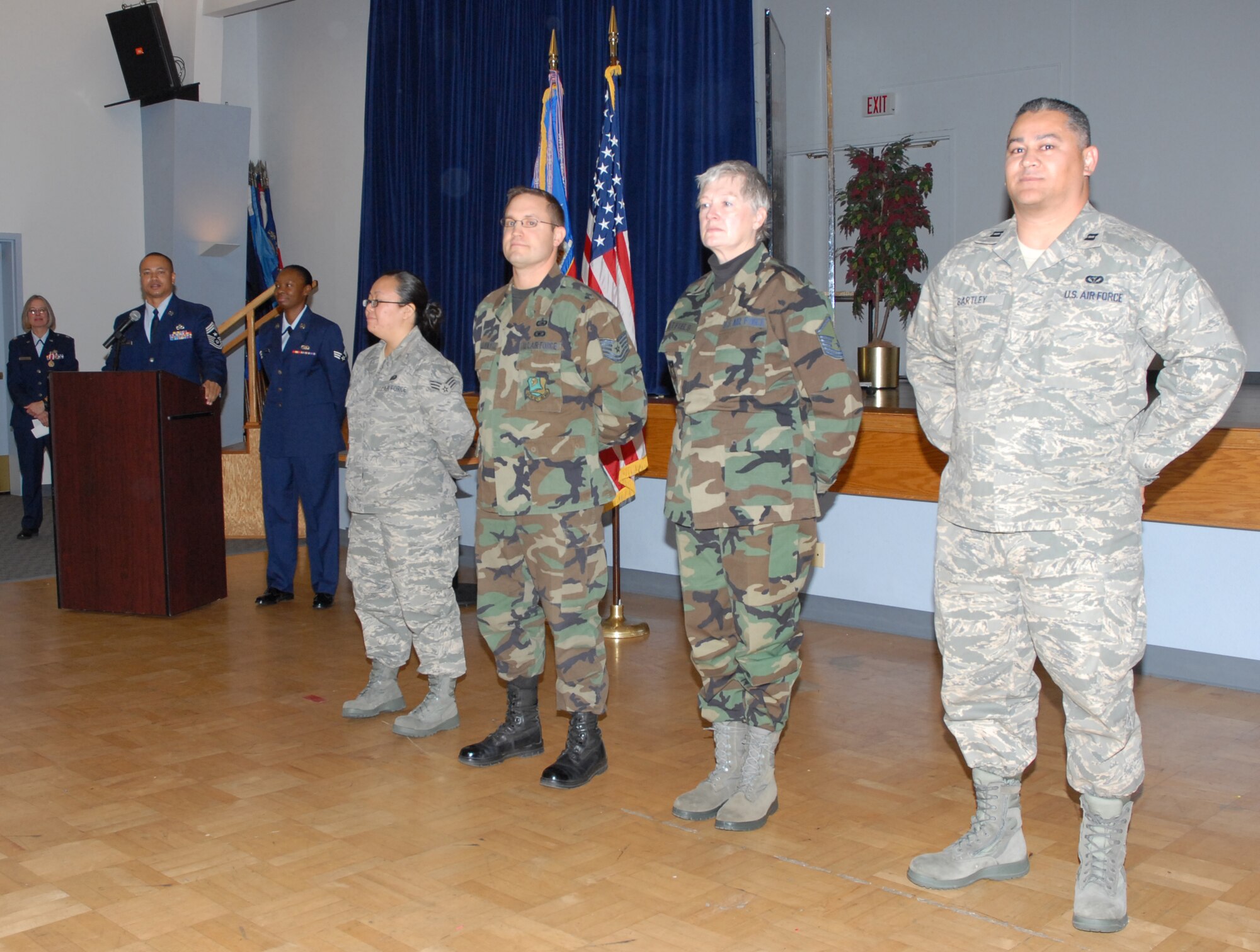 BEALE AIR FORCE BASE, Calif. -- 940th Air Refueling Wing command chief, Air Force Reservist Jason Henderson congratulates the 940th ARW 2008 Airmen of the Year during the wing's commanders call here Dec. 7, 2008.  This year's winners (left to right):  Airman of the Year, Senior Airman Mary Cha, 940th Services Squadron; Noncommissioned officer of the Year, Tech. Sgt. John Gallant, 940th Mission Support Flight; Senior NCO of the Year, Master Sgt. Ellen Hatfield, 940th ARW public affairs; Company Grade Officer of the Year, Capt. Rudolph Bartley, 940th Civil Engineer Squadron. (U.S. Force Photo/ Tech. Sgt. Luke Johnson)
