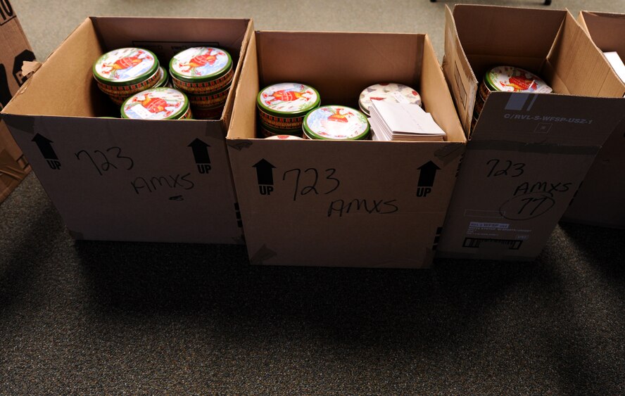 MOODY AIR FORCE BASE, Ga. -- During this year’s cookie drive, cookies were separated by the Moody Spouses Club volunteers Dec. 3 here. First sergeants delivered the cookies to the Airmen who reside in the dormitories on base. (U.S. Air Force photo by Airman Joshua Green) 