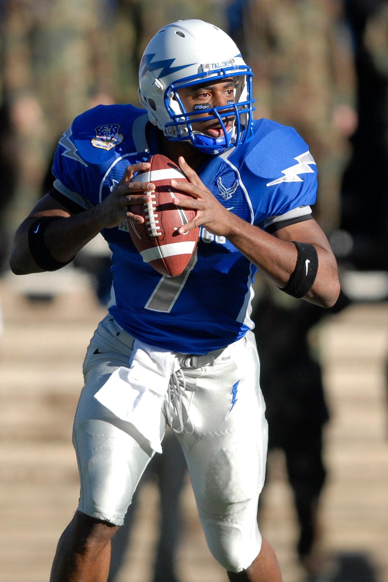 Air Force Falcon quarterback Tim Jefferson looks for a receiver during a 38-24 loss to the Brigham Young University Cougars at Falcon Stadium in Colorado, Nov. 15. Jefferson was named the Mountain West Conference's freshman of the year by Sporting News, according to a release Dec. 15 by the sports magazine. Jefferson also earned MWC freshman-of-the-year honors in a vote of head coaches and media within the league earlier this month. (U.S Air Force photo/Mike Kaplan)