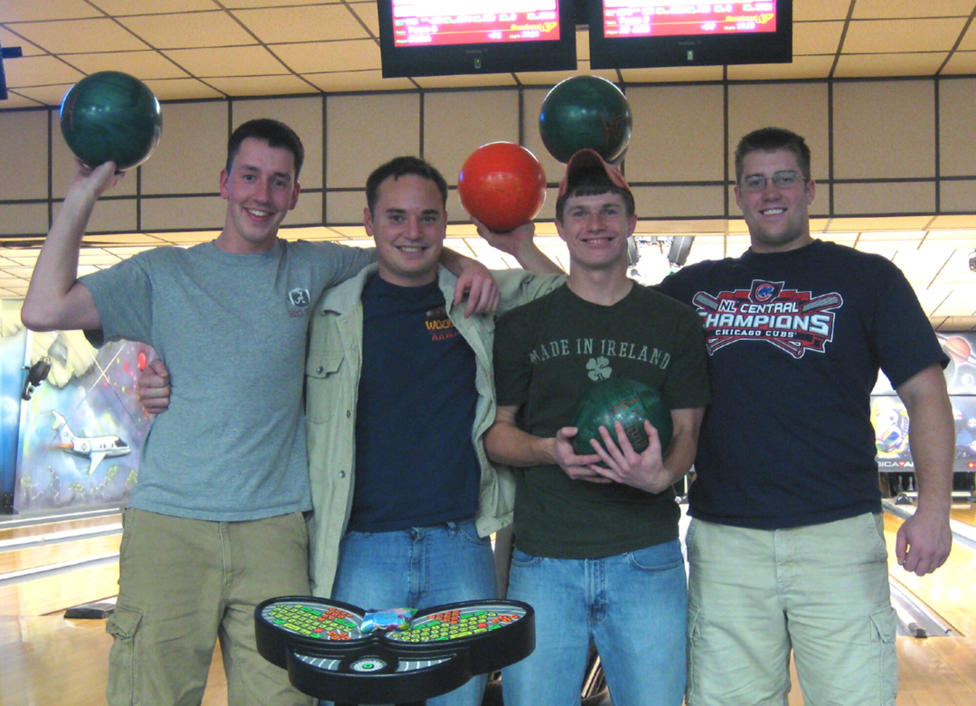 Team Fountain of Youth poses for a photo at the Tuesday Night Mixed league Tuesday at the Columbus AFB bowling alley. Paul “SOMF” Fowler, Mark “Cuba” Govea, Andrew “Squirrel” Walter, Andy “Cholo” Johnson are all members of the 14th Operations Support Squadron and make up team Fountain of Youth. The league consist of 10 teams and runs for 30 weeks. (U.S. Air Force photo by 2nd Lt. George Fowler)