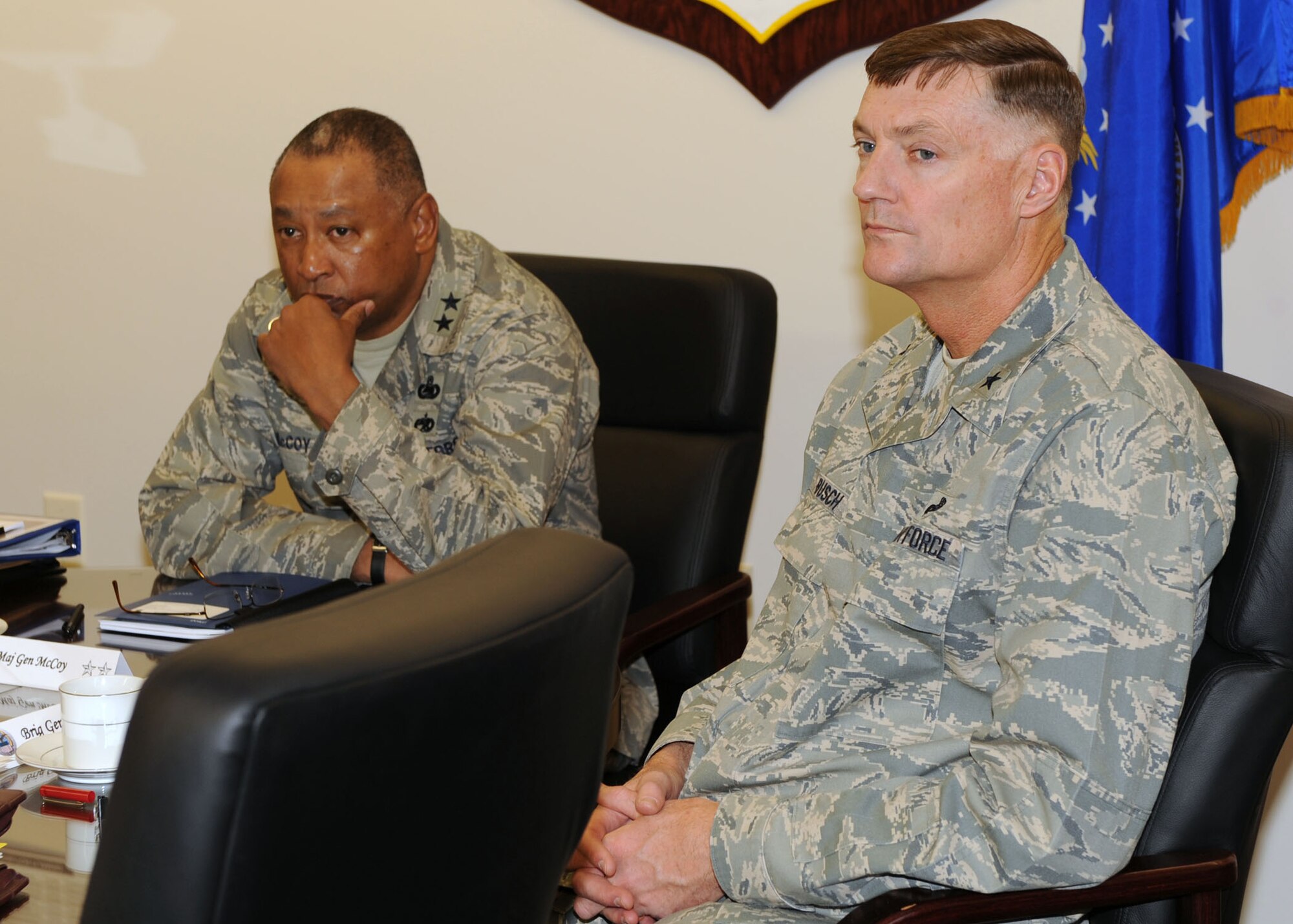 Maj. Gen. Gary McCoy, Air Force Global Logistics Support Center commander (left), along with Brig. Gen. Andrew Busch, the commander of Defense Supply Center Richmond, were among those receiving updates on critical supply chain issues and proposed solutions during a Dec. 12 briefing at Scott Air Force Base, Ill. (Air Force photo by Airman 1st Class Wesley Farnsworth)