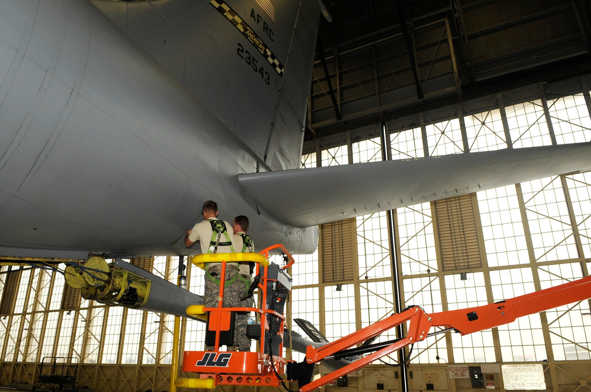 Staff Sgt. Charles Crespo, 6th Maintenance Squadron Aircraft Hydraulics Systems Specialist checks the hydraulic pressure in the left hydraulic system of a KC135 aircraft from Andrews AFB, Va. here, Dec. 11 in Hangar two. The KC135 has been here a week for a periodic inspection after being grounded for two months at Andrews  due to shortage of personnel. The aircraft was granted a one time flight to MacDill in order to have the periodic inspection conducted faster, saving time and using manpower efficiently, all part of the Air Force Smart Operations for the 21st Century strategy. A KC135 receives two periodic inspections every five years. This inspection was completed in five days compared to three weeks with teamwork of 24 Airmen: 16 active duty from MacDill, four Reserve from the 927th Air Refueling Wing and four Airmen from Andrews.
