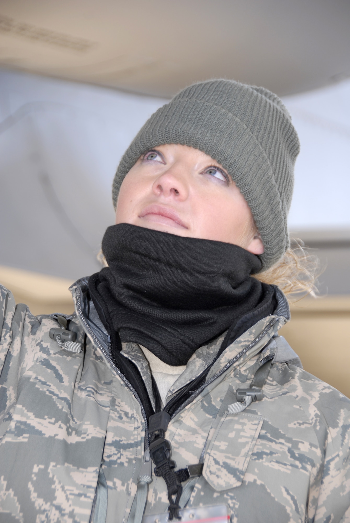 Senior Airman Andrea Sumner checks the fuel drain on the number-one, or left, engine on a 442nd Fighter Wing A-10 Thunderbolt II at Whiteman Air Force Base, Mo., Dec. 6, 2008, prior to the plane's launch on a training flight.  The 442nd is an Air Force Reserve Command unit, which operates, maintains and supports A-10 combat operations worldwide.  (U.S. Air Force photo/Staff Sgt. Tom Talbert) 