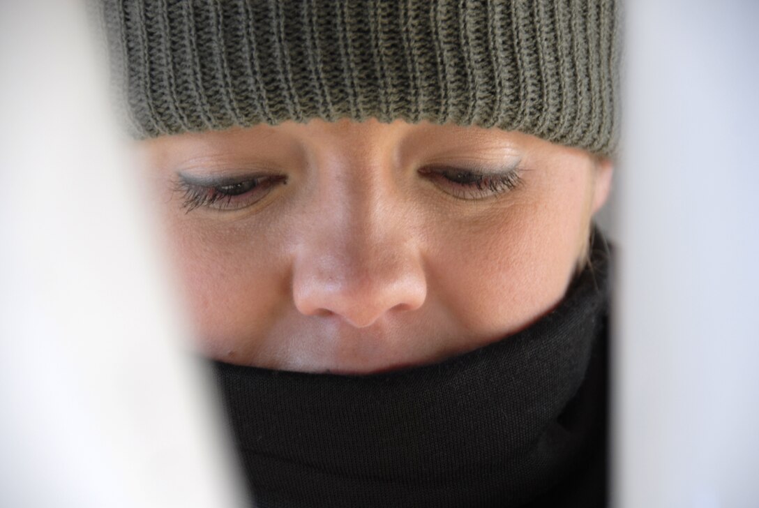 Senior Airman Andrea Sumner checks the nose-landing-gear assembly of a 442nd Fighter Wing A-10 Thunderbolt II at Whiteman Air Force Base, Mo., Dec. 6, 2008, prior to the plane's launch on a training flight.  The 442nd is an Air Force Reserve Command unit, which operates, maintains and supports A-10 combat operations worldwide.  (U.S. Air Force photo/Staff Sgt. Tom Talbert) 