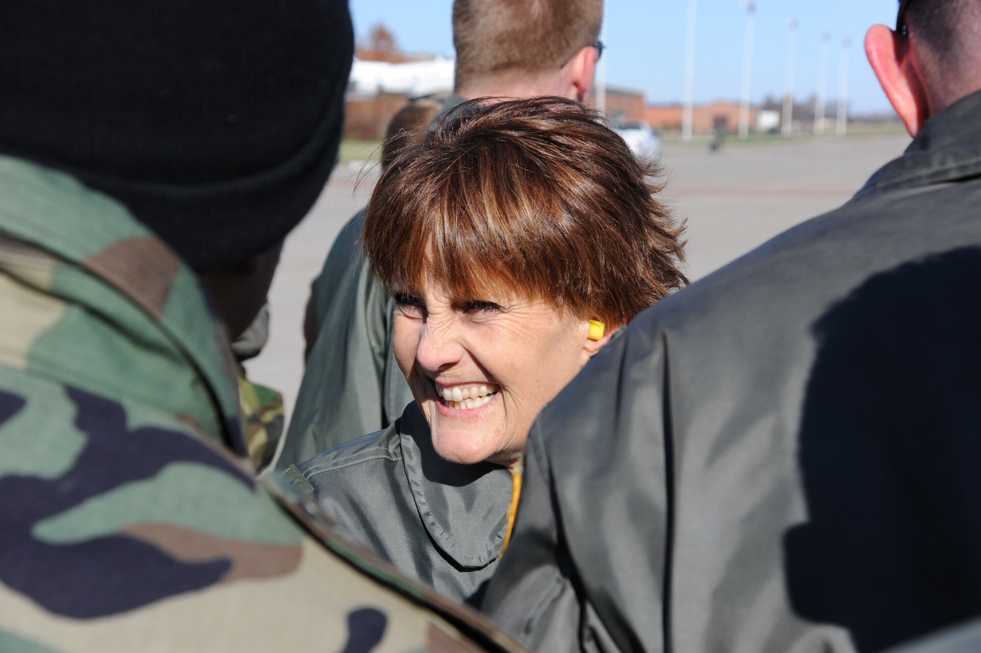 Lt. Col. Sally bird stands amid a group of 932nd Airlift Wing Air Force Reservists as they prepare for a flight over water.  She will be retiring soon and will have a story featured in the Gateway paper's upcoming issues.  (U.S. Air Force photo/Tech Sgt. Gerald Sonnenberg)