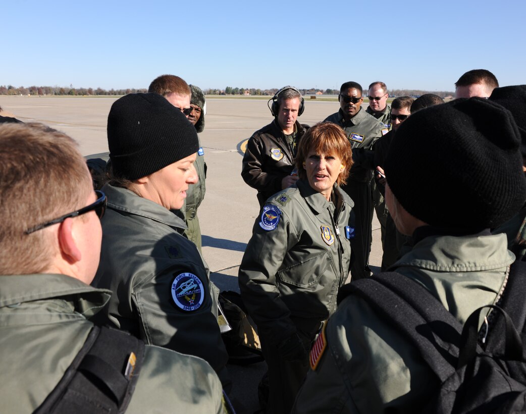 932nd Airlift Wing and 931st Air Refueling Group members gather around Lt. Col. Sally Bird (center) to get a briefing before flying on an aeromedical evacuation training mission over St. Croix.  (U.S. Air Force photo/Maj. Stan Paregien)
