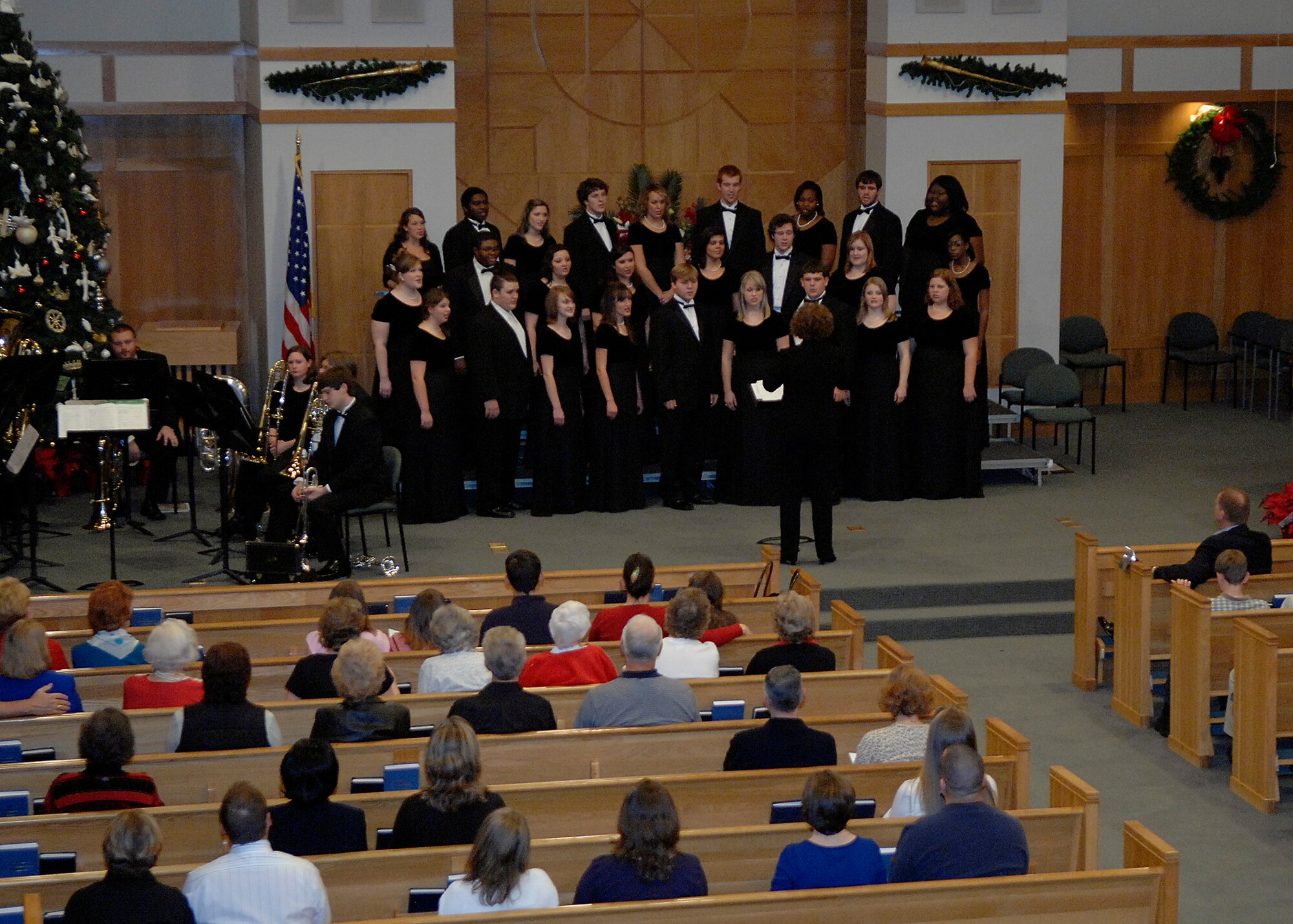 The Charleston Southern University Horton School of Music choir sings various selections of holiday music at the chapel on Charleston AFB Dec. 11. This is the second year the choir has performed on base during the holiday season. (U.S. Air Force photo/Airman 1st Class Katie Gieratz)