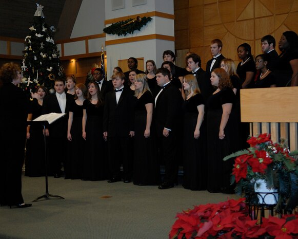 The Charleston Southern University Horton School of Music choir sings various selections of holiday music at the chapel on Charleston AFB Dec. 11. This is the second year the choir has performed on base during the holiday season. (U.S. Air Force photo/Airman 1st Class Katie Gieratz)