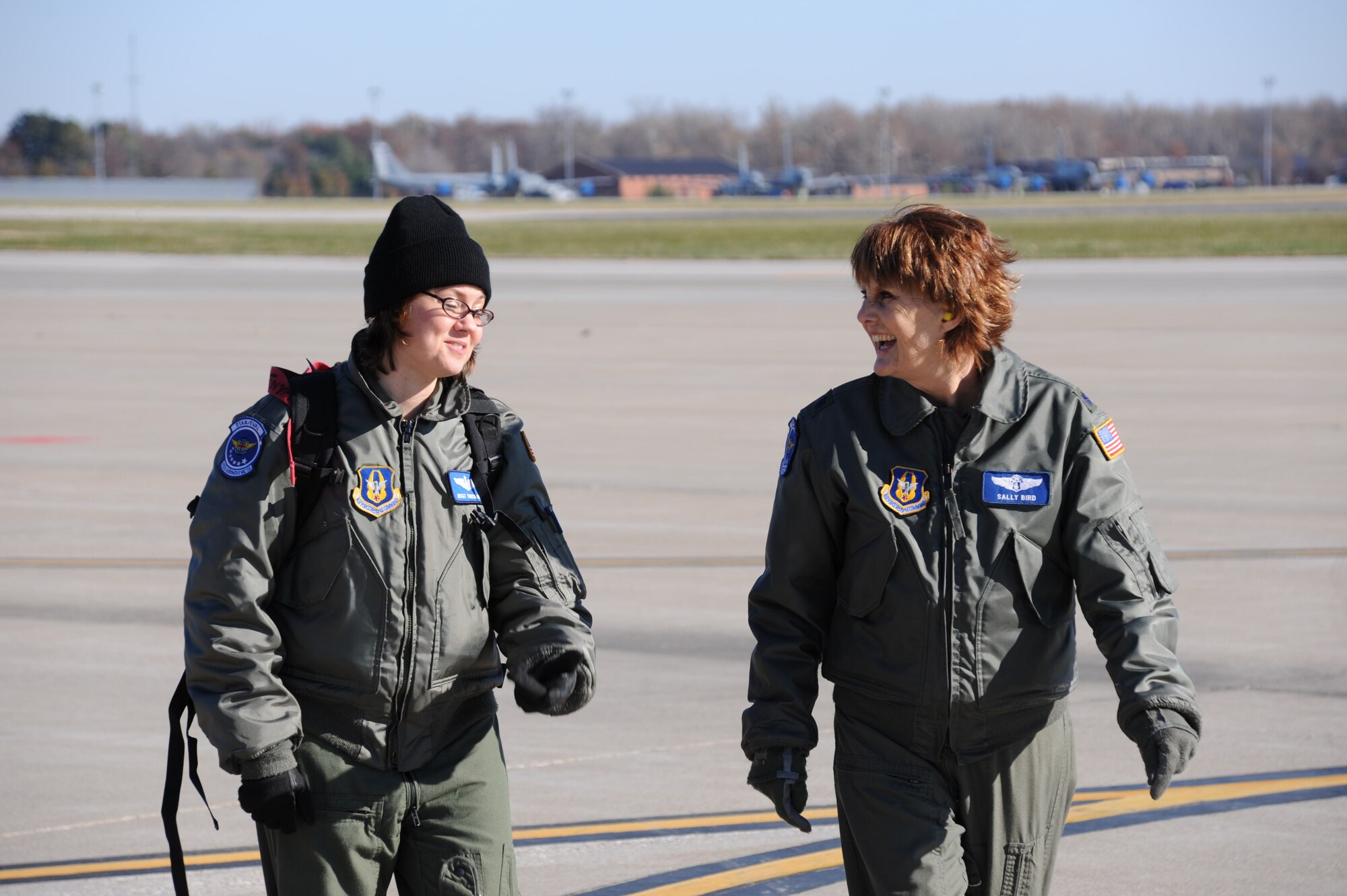Master Sgt. Tonya Hupp shares a laugh with Lt. Col. Sally Bird who was preparing for her final aeromedical evacuation training flight with the 932nd Airlift Wing.  She will retire in early 2009 from the unit at Scott Air Force Base.  (U.S. Air Force photo/Maj. Stan Paregien)