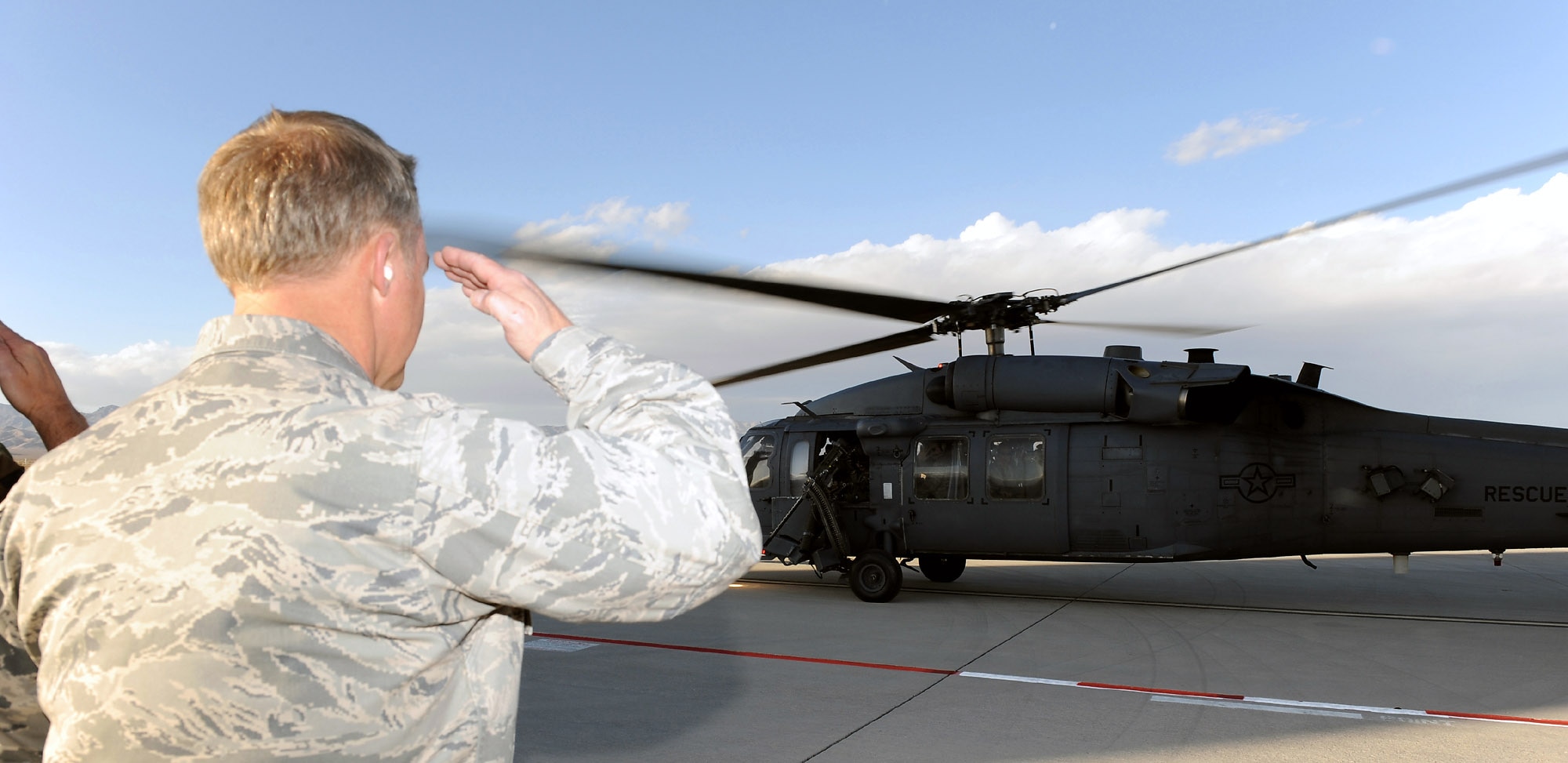 Col. Chris Chambliss salutes Gen. Norton Schwartz, Air Force Chief of Staff, as he departs from Creech Air Force Base, Nev., enroute to the U.S. Air Force Weapons School graduation ceremony at Nellis AFB, Nev., Dec. 13. Colonel Chambliss is the 432nd Wing and 432nd Air Expeditionary Wing commander. (U.S. Air Force photo/Staff Sgt. Kenneth Kennemer)