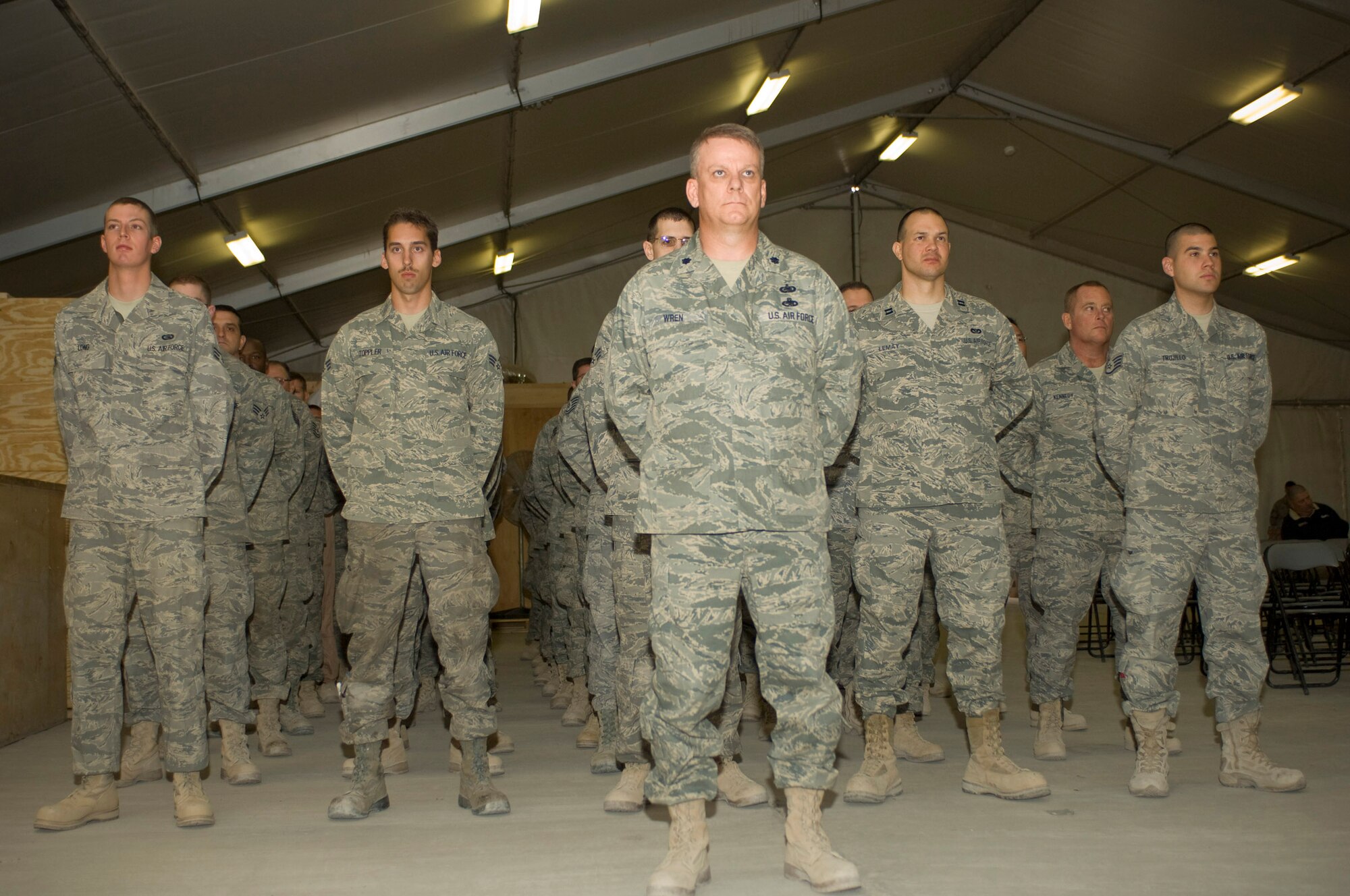 Lt. Col. Donald Wren, 451st Air Expeditionary Group vice commander, commands a flight of Airmen during the 451st AEG change of command ceremony Dec. 13 at a base in Southern Afghanistan. The 451st AEG, a geographically separated unit of the 455th Air Expeditionary Wing, is comprised of more than 400 Airmen. (U.S. Air Force photo by Staff Sgt. Rachel Martinez) (Released)