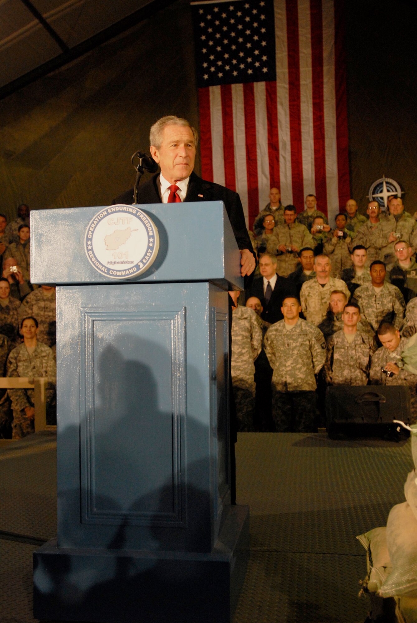 President George W. Bush speaks to the service members of Combined Joint Task Force-101 at Bagram Air Field, Afghanistan, during his last visit as their commander in chief, Dec. 15.  (Photo by Spc. Mary L. Gonzalez, CJTF-101 Public Affairs)(Released)